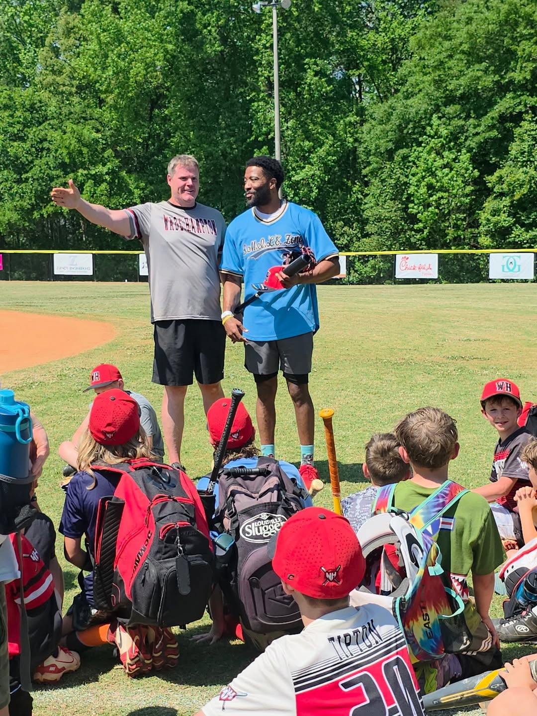 Jay coaching kids at clinic